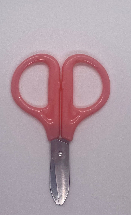 Glazed pink scissors